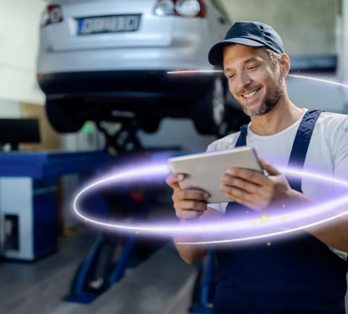 happy-auto-repairman-working-touchpad-workshop-twist